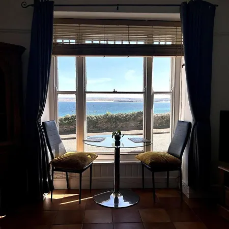 Apartment 'rocks' Sea Views With Free Parking In